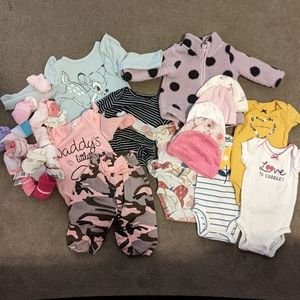 Bundle of newborn baby girl clothes